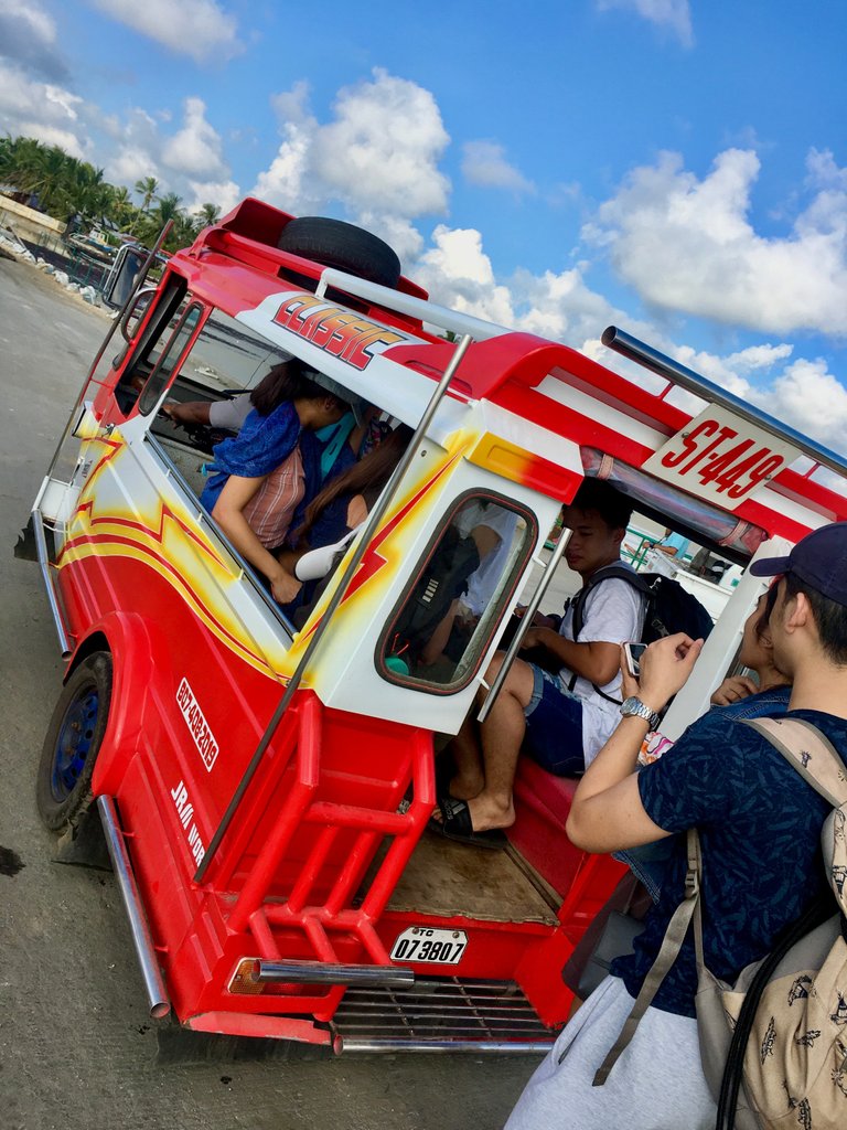 A tricycle fashioned to look like a jeepney was our means of transportation to our homestay