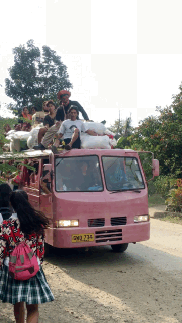"Toploading": A common means of transportation in Toledo. Passengers would pay 10-15 pesos to hitch a ride on top a jeepney towards the mountain top