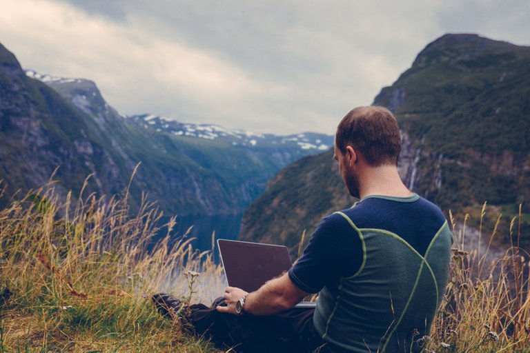 Canva  Man Working in the Mountains.jpg