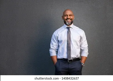portrait-successful-black-businessman-standing-260nw-1408432637.webp