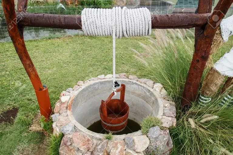 30942647-water-well-with-pulley-and-bucket (1).webp