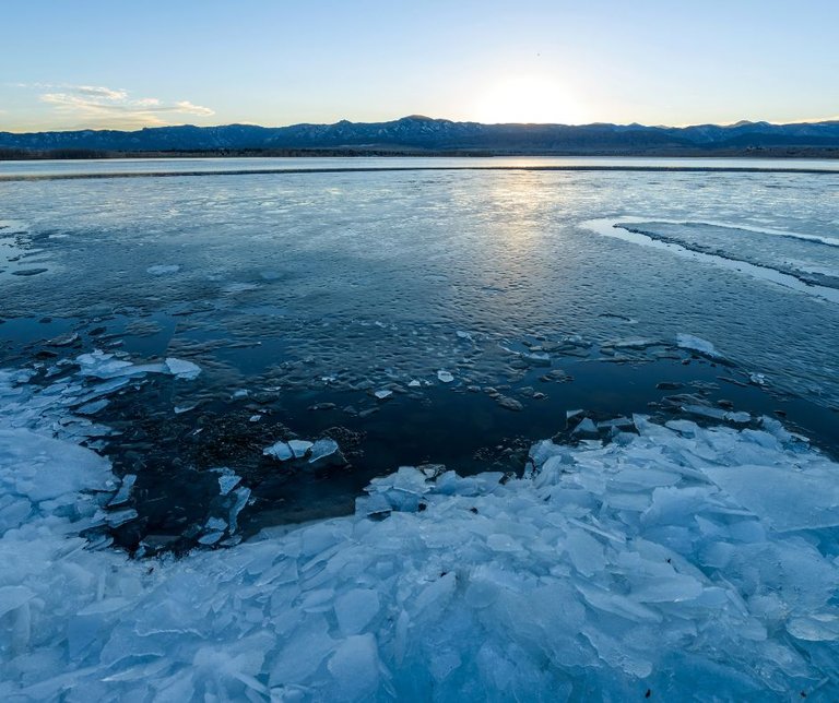 (Icy lake: photo licensed via Canva)