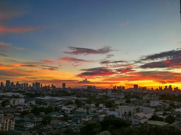 Overlooking parts of Mandaluyong and Manila cities from the balcony