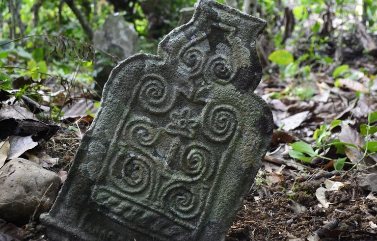 Figure 6. An ancient tombstone with carvings showing unique ornate figures from the works of past artists..JPG