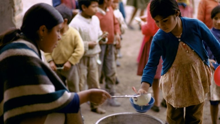 780x439_girl_receiving_soup.jpg