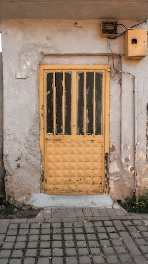 free-photo-of-yellow-vintage-door-in-building.jpeg