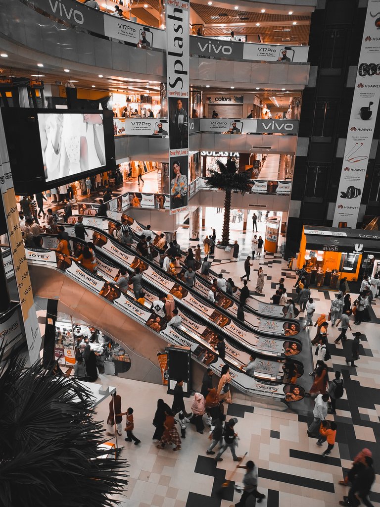 Canva  People Inside A Mall.jpg