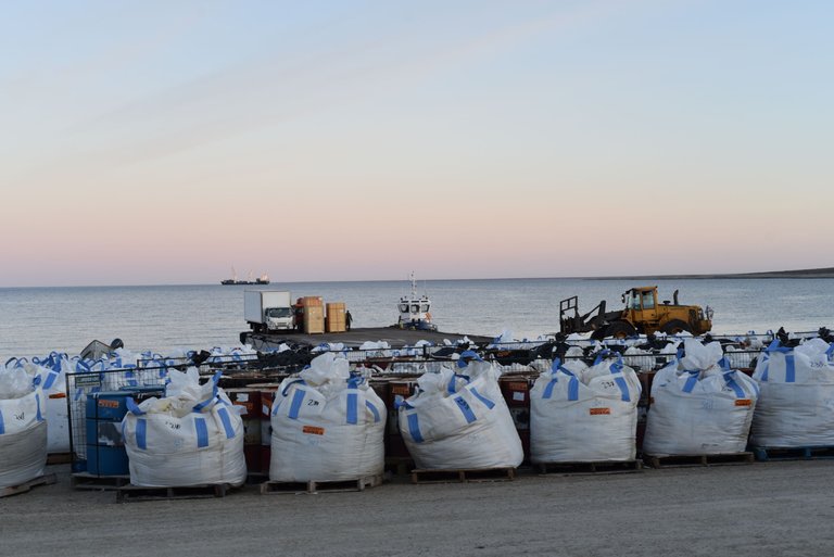 Bags from the Igloolik Co-Op Fire awaiting transport to the barge. Igloolik does not posess the ability to safely deal with the waste from a commercial fire.