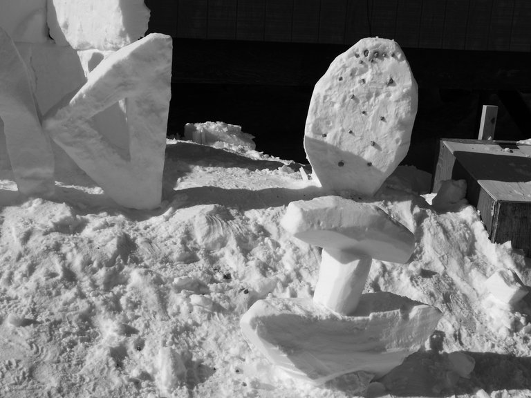 Easter egg decorated with stones and a Snow Ulu, a traditional Inuit knife.