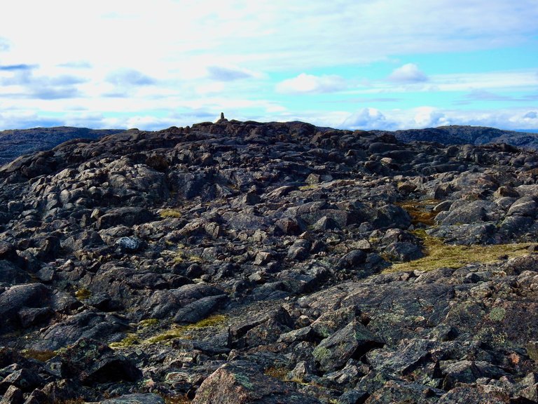 These rocks should be pink, But Lichen is a persistent, patient creature.