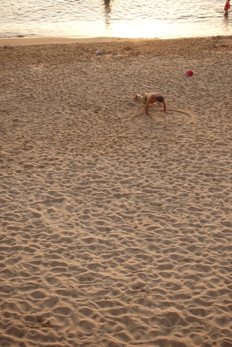 A middle-aged man is exercising