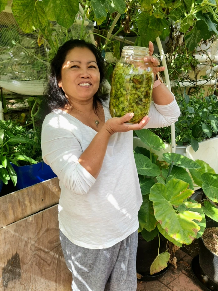 A big smile and a big jar of Hops tincture made with using method.