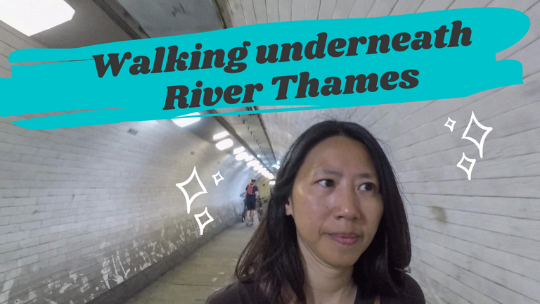 Walking underneat the River Thames.png