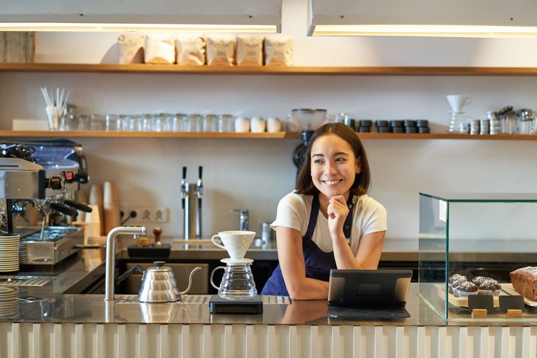 cafe-small-business-smiling-asian-barista-apron-standing-counter-coffee-shop-workin.jpg