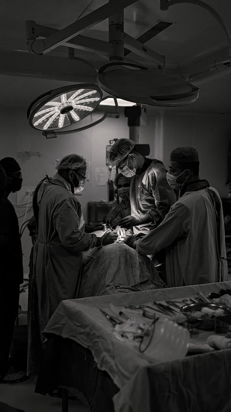 free-photo-of-surgeons-working-in-black-and-white (1).jpeg