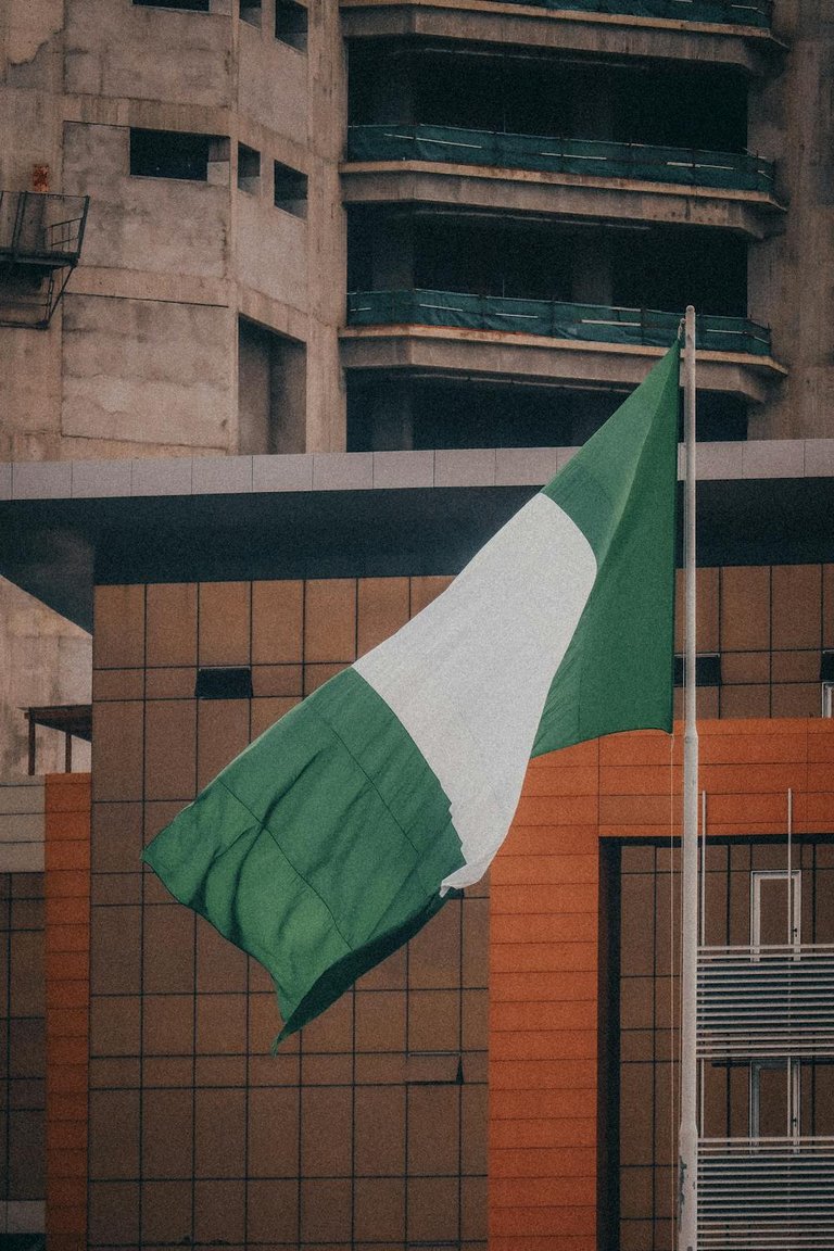 free-photo-of-nigerian-flag-waving-in-urban-environment.jpeg