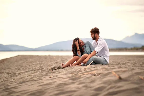 depositphotos_398760918-stock-photo-young-beautiful-caucasian-couple-sitting.jpg