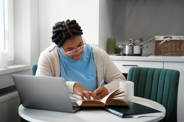 medium-shot-woman-with-laptop-home_23-2150170910.jpg