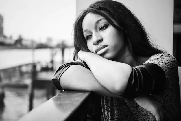 african-american-woman-is-sitting-contemplating-something_53876-15313.webp