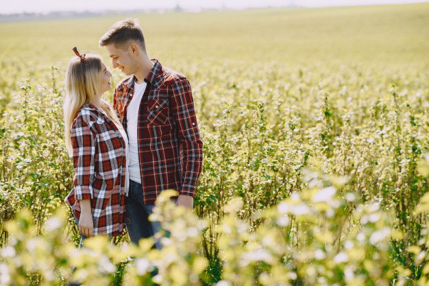 young-man-woman-couple-summer-field_1157-36525.jpg