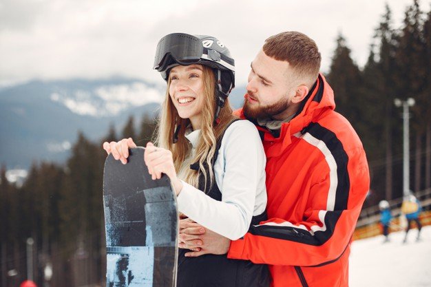 couple-snowboard-suits-sports-people-mountain-with-snowboard-hands-horizon-concept-sports_1157-46197.jpg