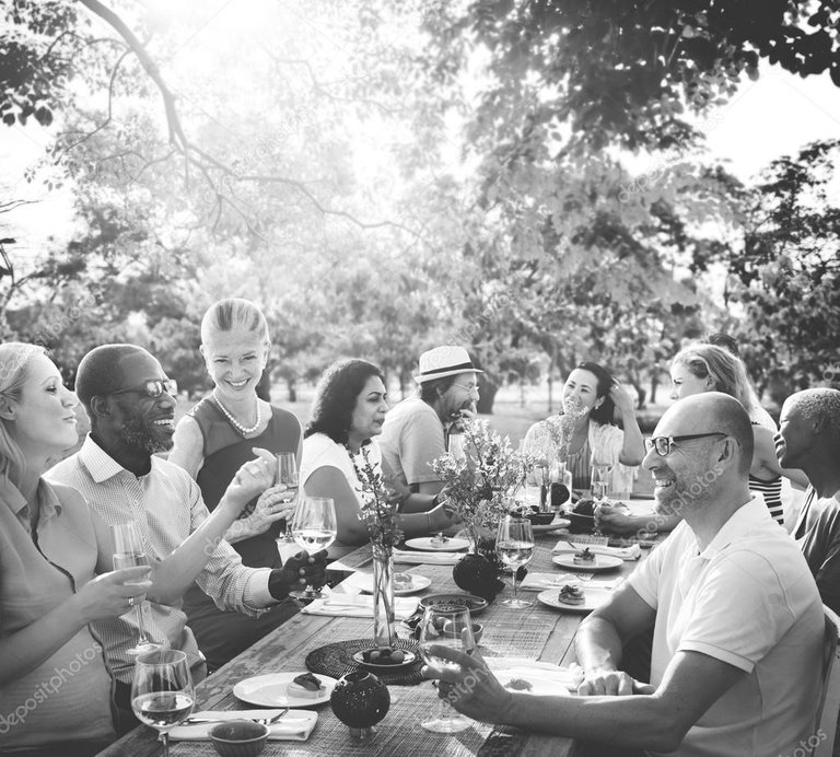 depositphotos_116407372-stock-photo-people-sitting-at-table-and.jpg