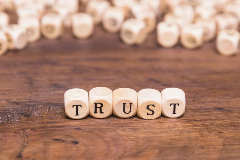 trust-word-made-with-wooden-blocks.jpg