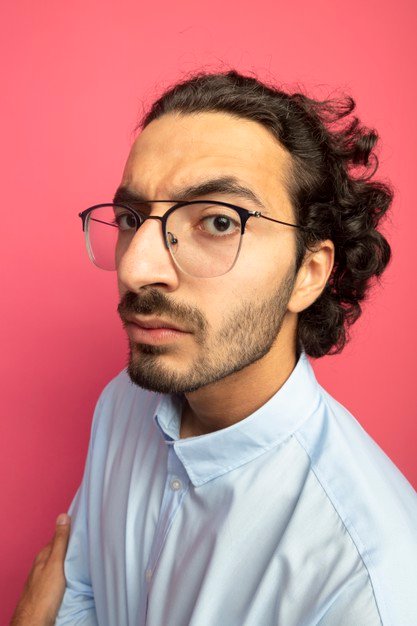 close-up-view-strict-young-handsome-caucasian-man-wearing-glasses-standing-profile-view-isolated-crimson-wall_141793-79811.jpg