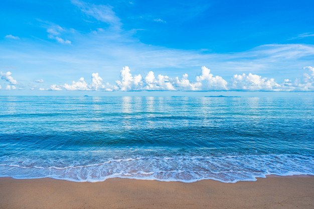 beautiful-tropical-beach-sea-ocean-with-white-cloud-blue-sky-copyspace_74190-8663.jpg
