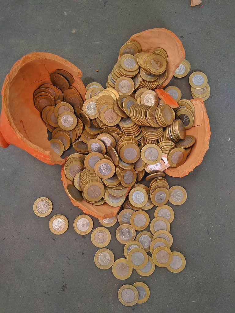 free-photo-of-rupee-coins-in-a-broken-piggy-bank.jpeg