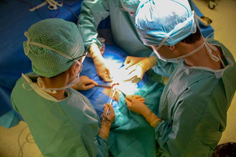 free-photo-of-high-angle-view-of-doctors-during-an-operation.jpeg