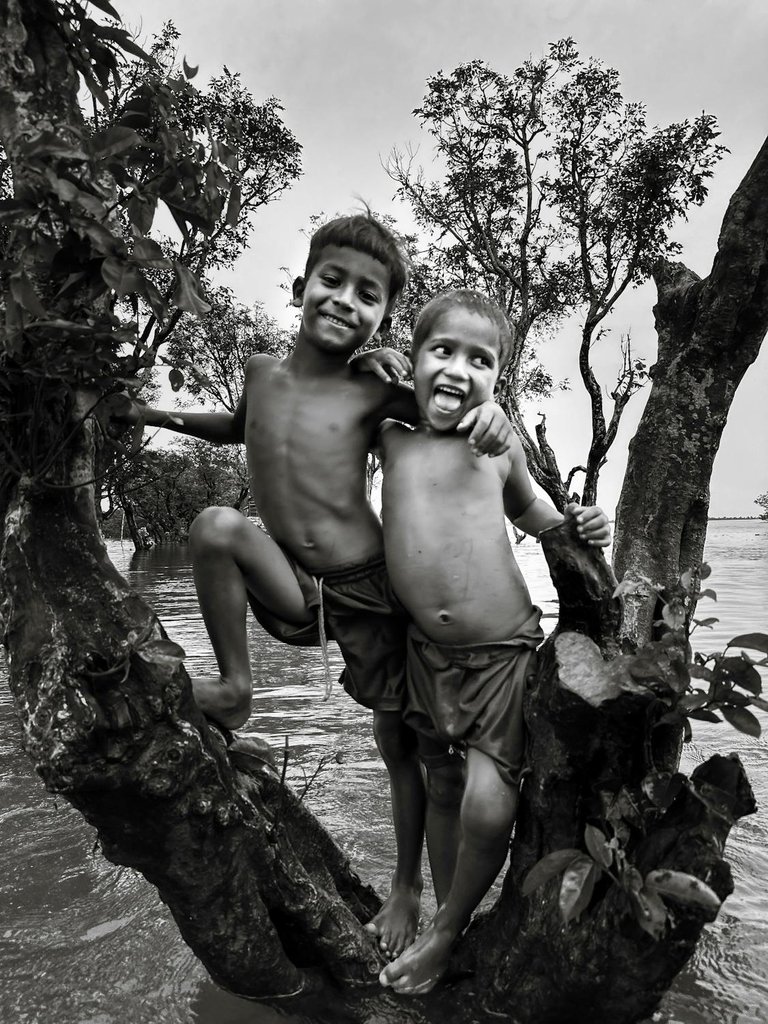 free-photo-of-joyful-boys-playing-in-flooded-landscape.jpeg