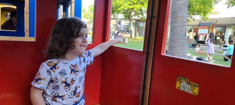 Riding a train at a local shopping mall