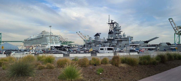 The USS Iowa with a cruise ship in the background