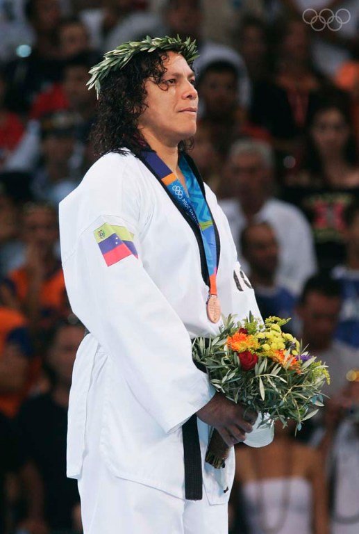 AdrianaCarmonaofVenezuelareceivesthebronzemedalduringthewomensover67kg.jpg