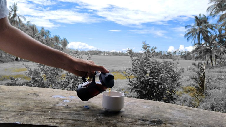 Brewing local coffee at the farm