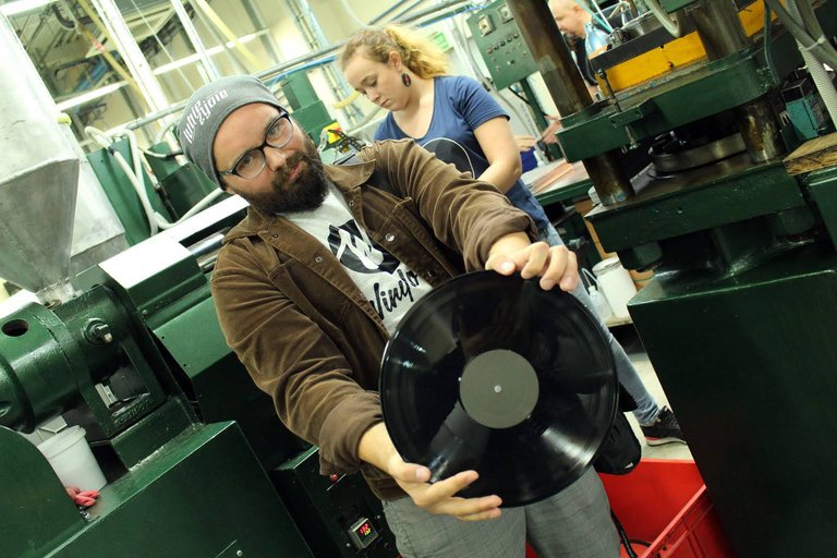 Pressing vinyl records