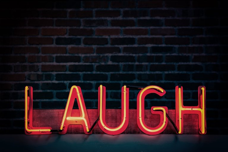 laughneonlightsignageturnedon1115680.jpg