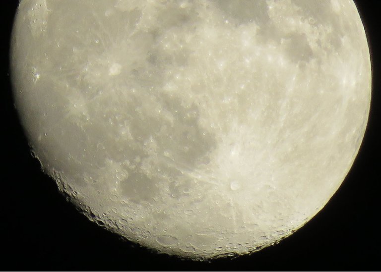 close up near full moon showing details on surface.JPG
