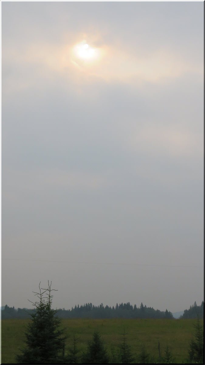 sun  peeking through the clouds and smoke haze.JPG