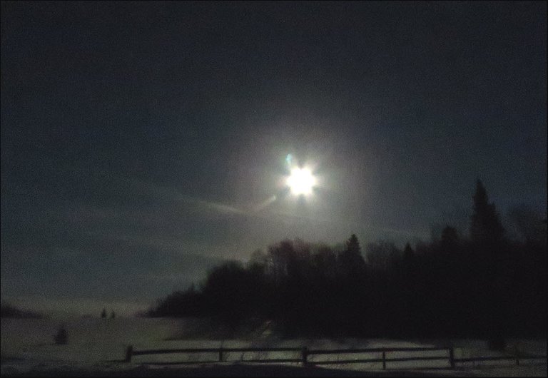 scene of full moon shining over the field.JPG