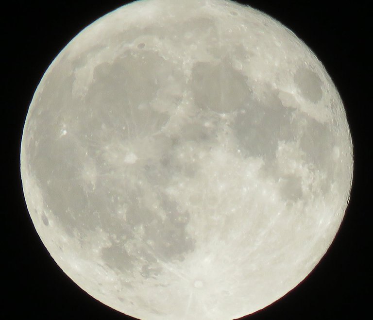 close up full moon showing details on surface.JPG