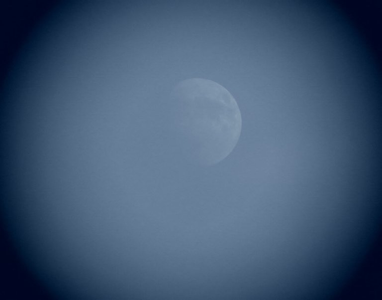focus ring around close up of moon with slight cloud.JPG