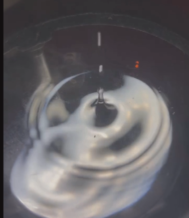 Drops of Pure Alcohol dripping into the Receiving Flask.