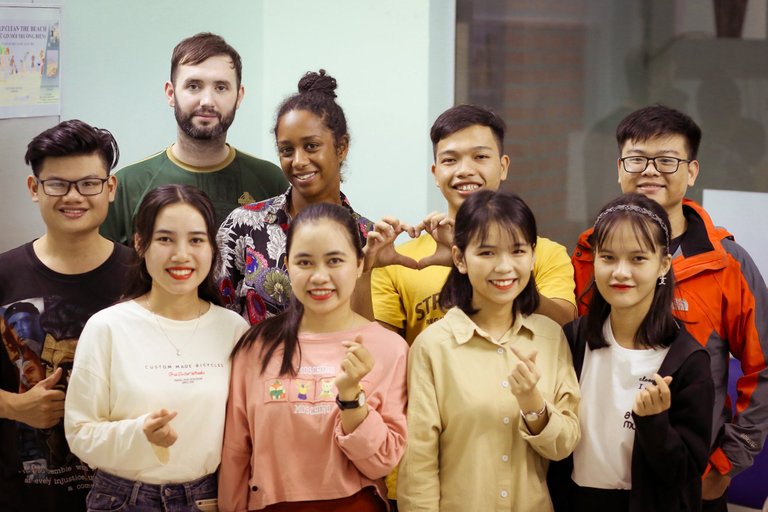 Rem (on the left) and his students after an exciting conversation with two friends from England.