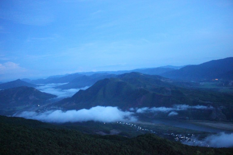 He took this picture in the early morning on a top of a mountain nearby