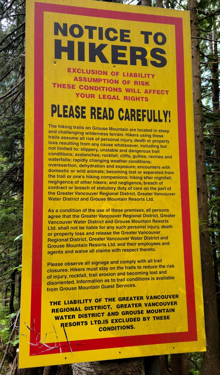grouse grind notice yellow sign.jpeg