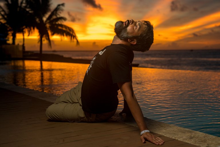 Bearded Middle Age Man, Facing Rejection and Too Little Sleep, at Infinity Pool