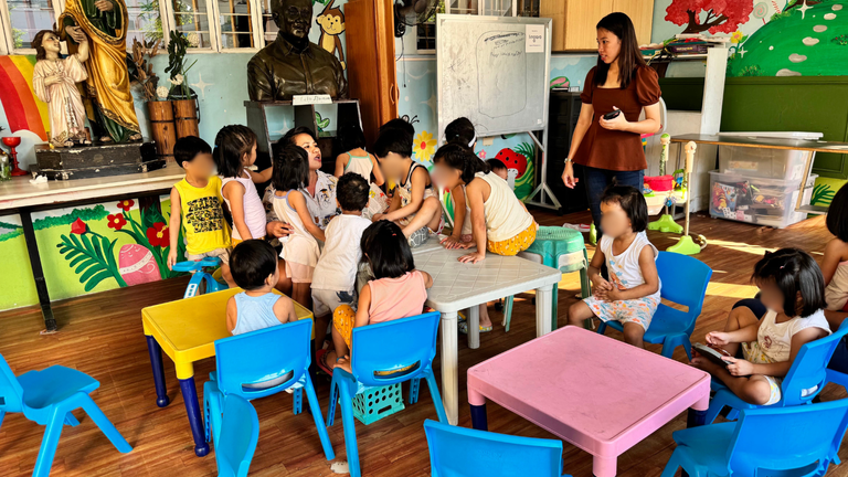 Reading aloud at the orphanage (2).png