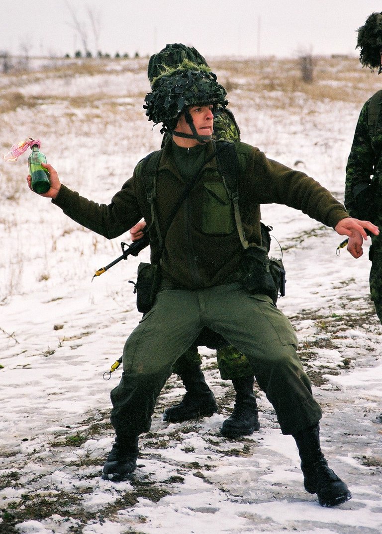 1280px-Canadian_Forces_soldier_throwing_Molotov_cocktail.jpg